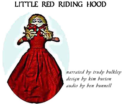 a doll in red dress as the little Red Riding Hood