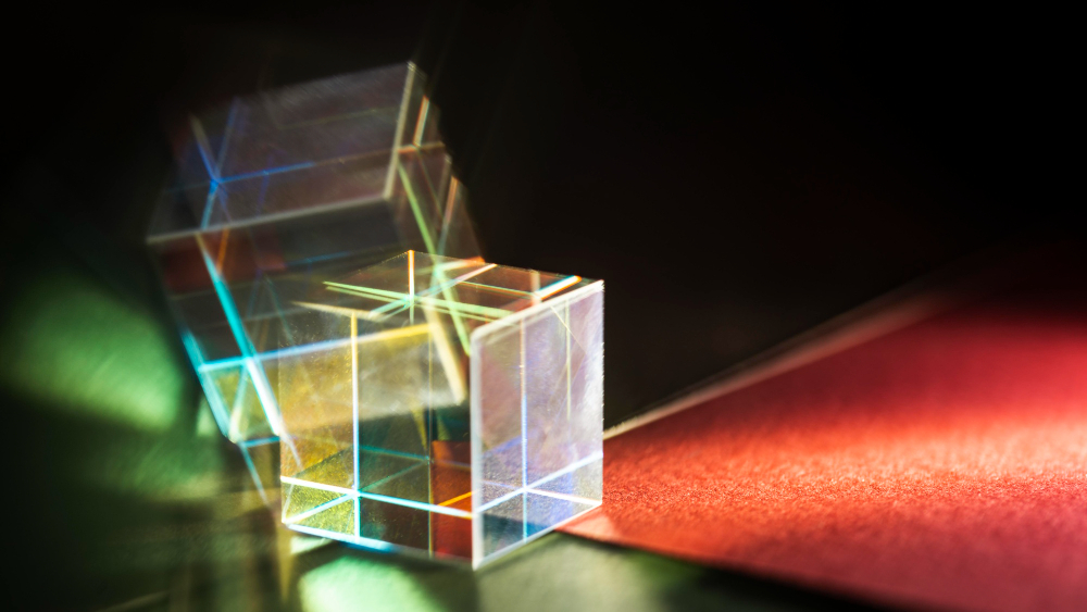 Two cube shaped prisms show diffraction of light
